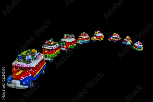 Fila trafico de autobus de juguete coloridos photo
