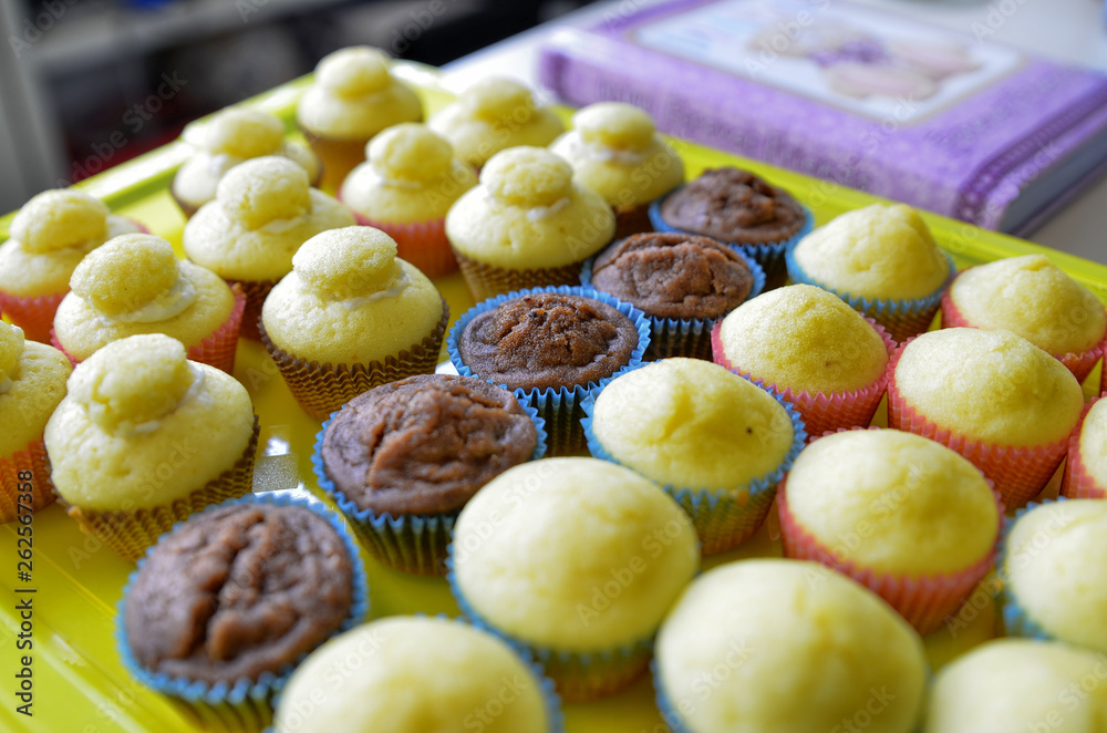 A tray full of cupcakes