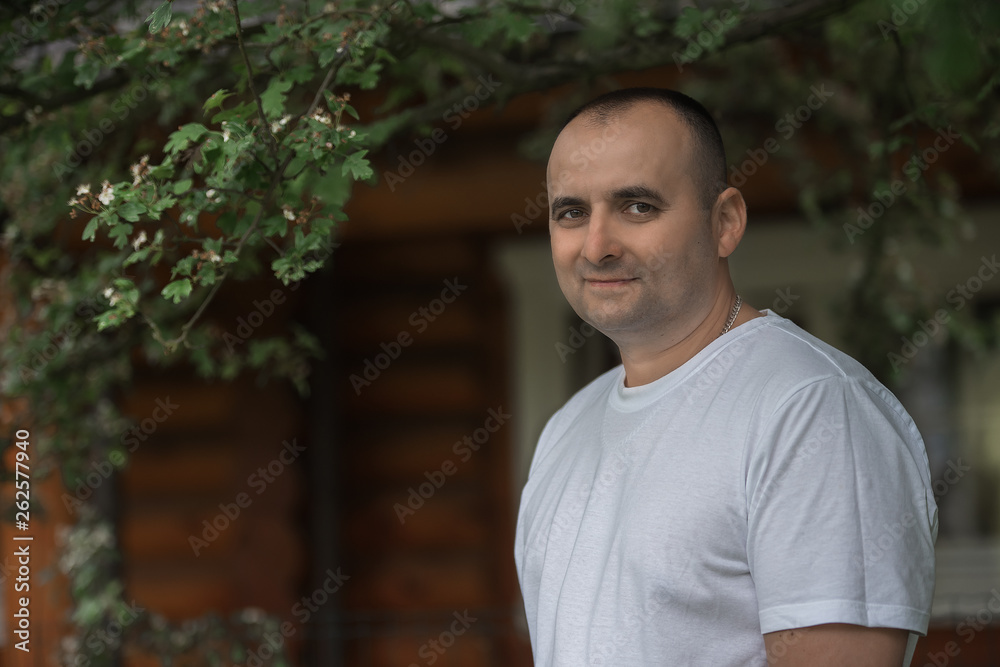 Portrait of a man on a background of nature. Portrait of a man on a background of nature.