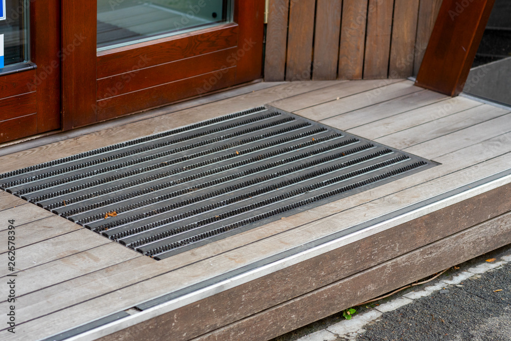 street mat in front of the entrance door street mat in front of the entrance door