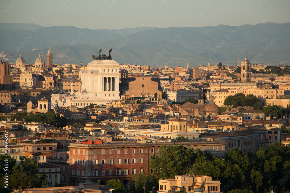 View of Rome. Panorama with mountains.