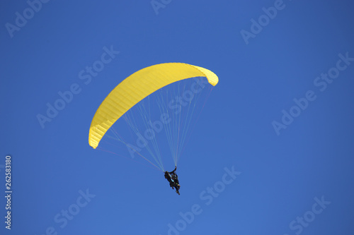 paraglider flying in the sky