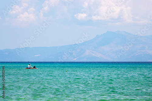 Paddleboarding at Ammolofoi Beach, Kavala Region, Northern Greece