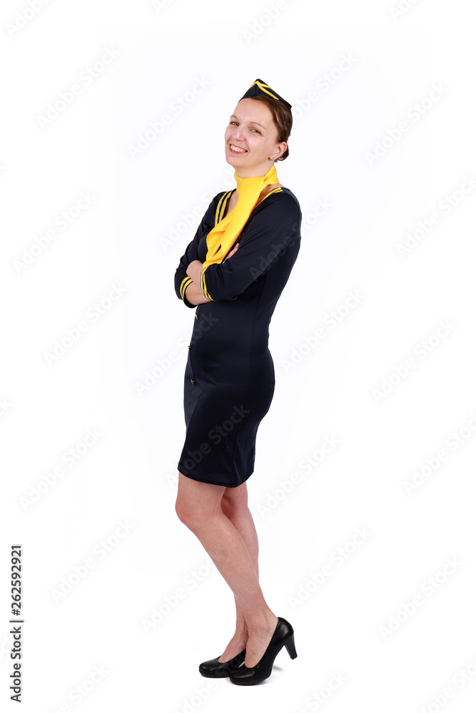 Stewardesse - Charming and smiling stewardess wearing in the blue uniform. Isolated on white background Stewardesse - Charming and smiling stewardess wearing in the blue uniform. Isolated on white background