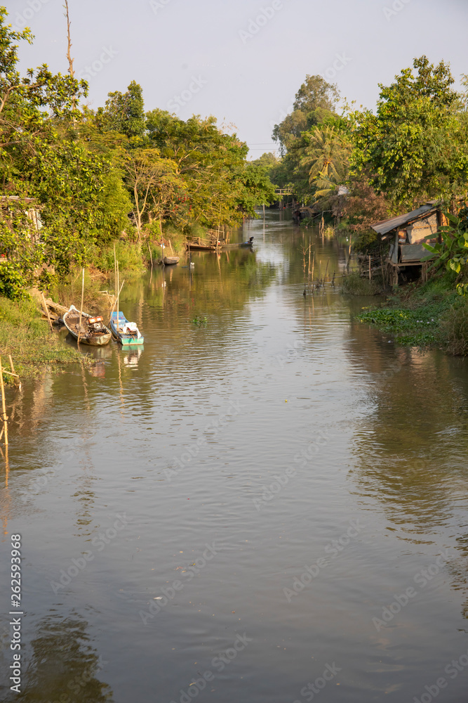 Village on waterfront in Mekong Delta of Vietnam