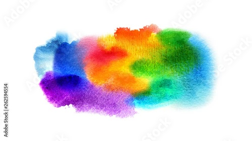 Beautiful multicolored, colorful spot appears on a white background. Bright cyan, yellow, red and orange paints spreads on paper forming a blot.