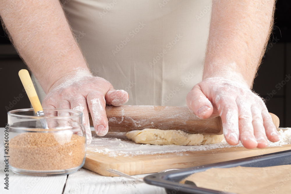 Making festive gingerbread dough on a baking sheet