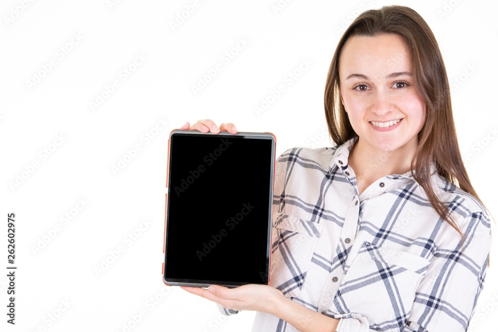 Happy young woman showing blank black empty tablet computer screen with copy space Happy young woman showing blank black empty tablet computer screen with copy space
