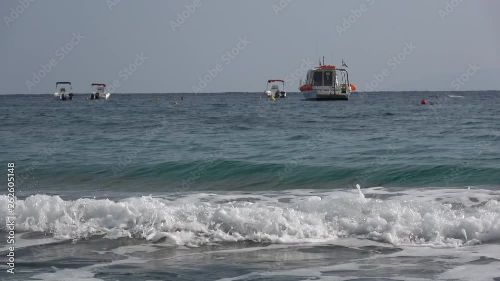 Small village Agia Pelagia on Crete Island, Greece. Mediterranean Sea, sun and cozy sand beaches. Small village Agia Pelagia on Crete Island, Greece. Mediterranean Sea, sun and cozy sand beaches.