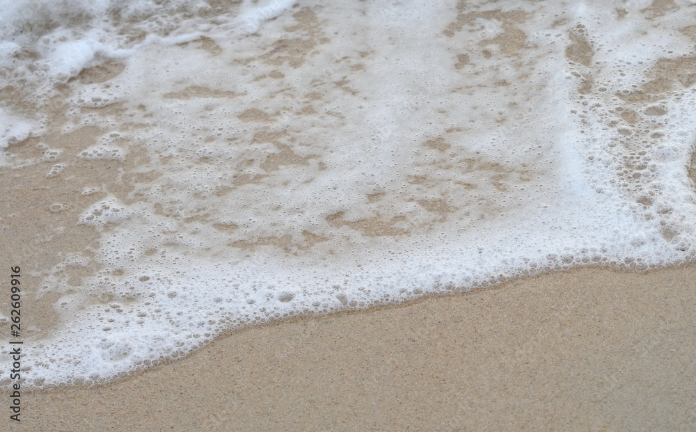 Beautiful soft waves of Blue Ocean with Sandy Beach Background close up. Sea sand wallpaper Beautiful soft waves of Blue Ocean with Sandy Beach Background close up. Sea sand wallpaper