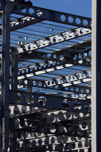 Building Girders with a blue sky