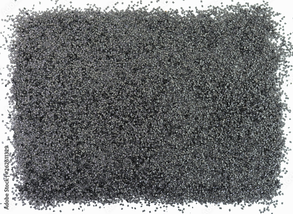 Gunpowder for a military or hunting rifle. Pile gunpowder, black powder isolated on white background.