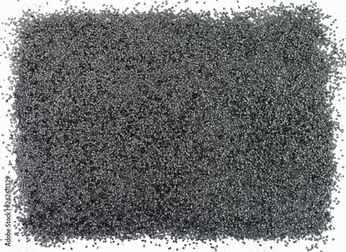 Gunpowder for a military or hunting rifle. Pile gunpowder, black powder isolated on white background.