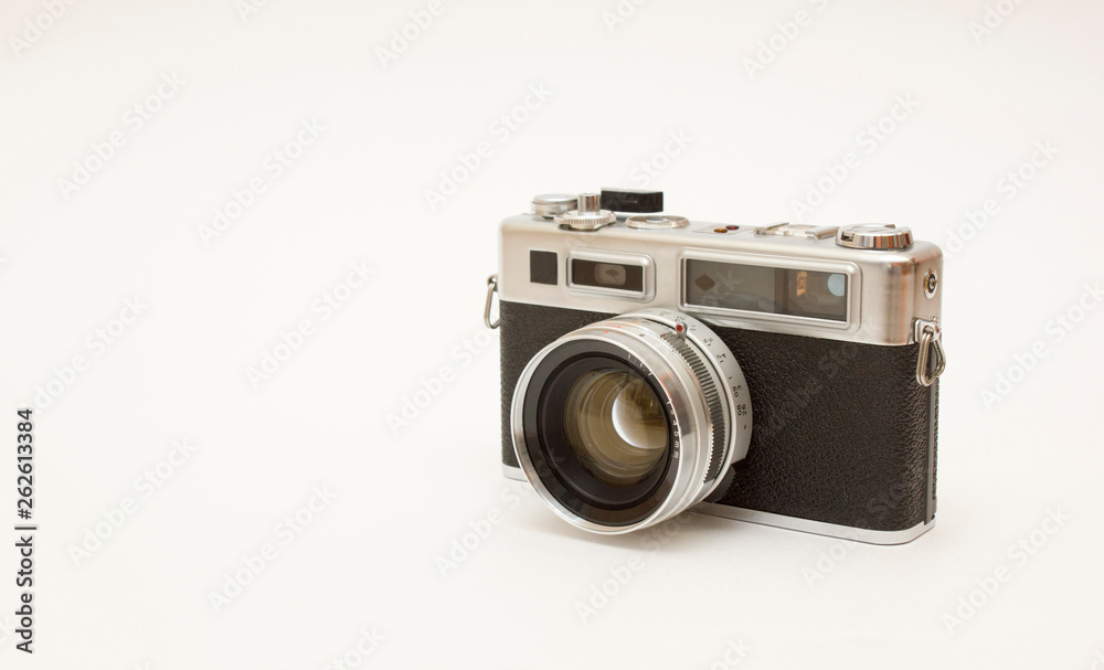 Old classic film photo camera on white background isolated with free space Old classic film photo camera on white background isolated with free space