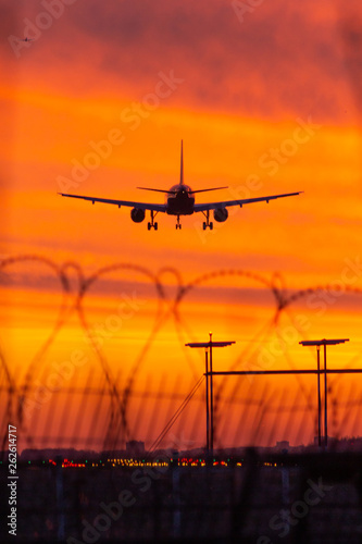 sunset plane landing freedom © evgris