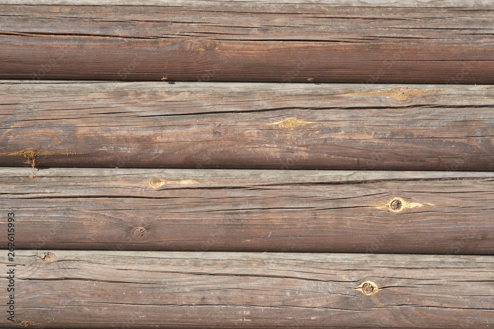 Timber logs. Wall of traditional hardwood timber house. Timber logs. Wall of traditional hardwood timber house.