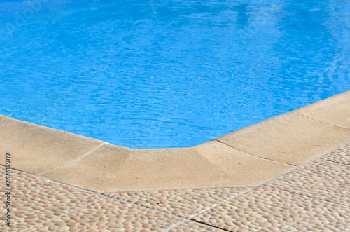 Close-up corner of swimming  pool at noon .