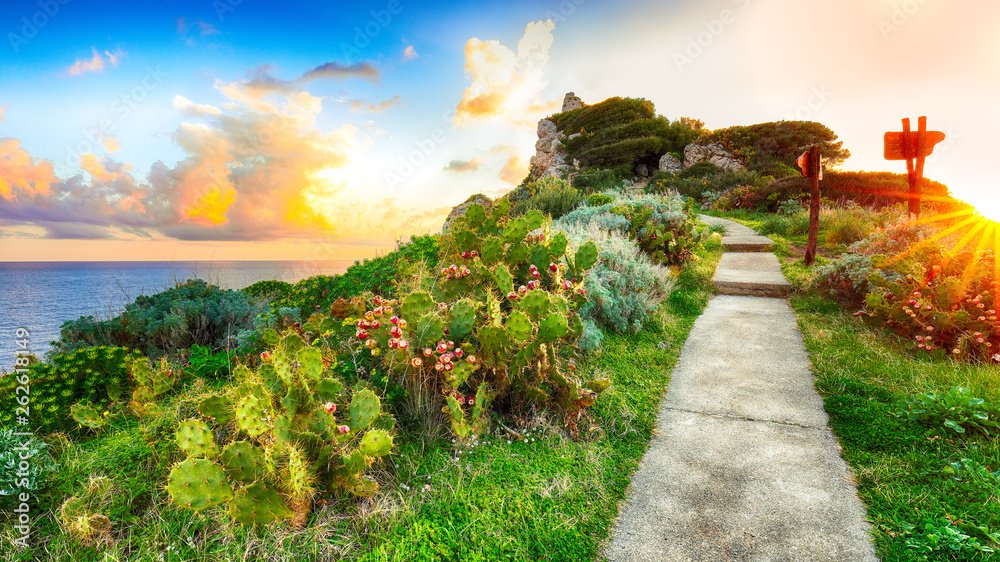Fototapeta premium Dramatic spring sunrise on the the cape Milazzo panorama of nature reserve Piscina di Vener