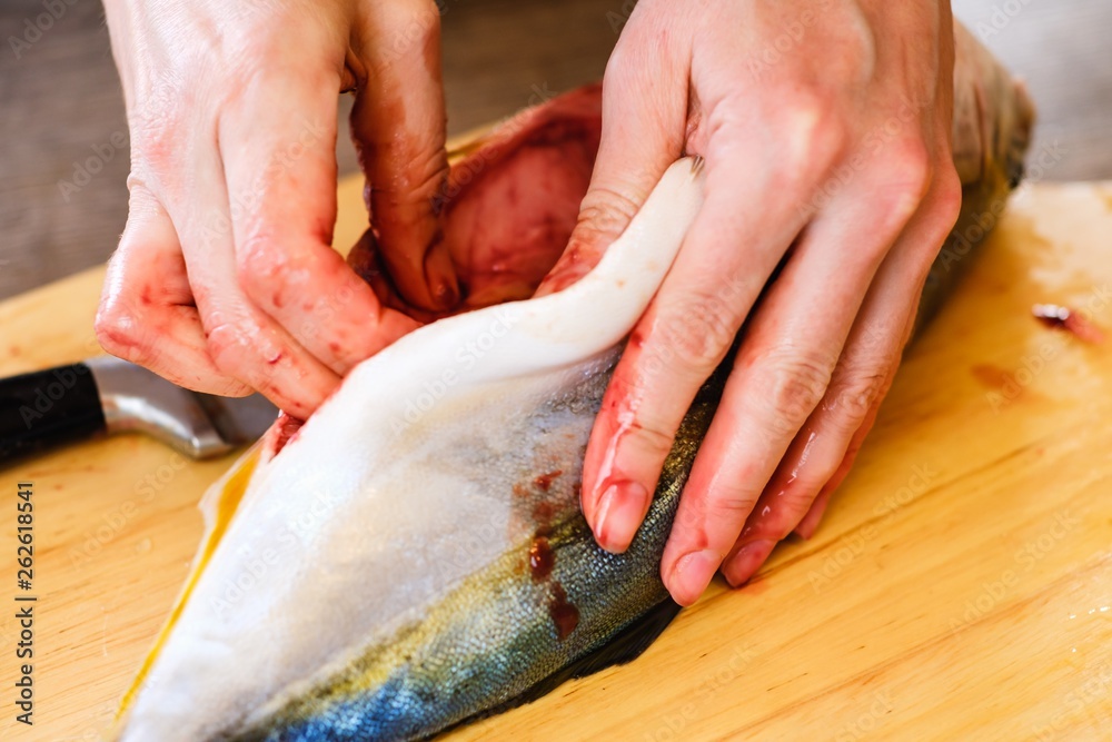 Cutting raw fish tuna food,  red sushi.