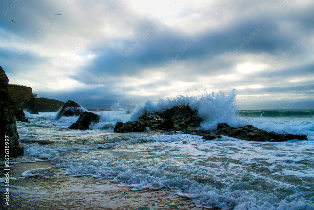 waves breaking on the rocks waves breaking on the rocks