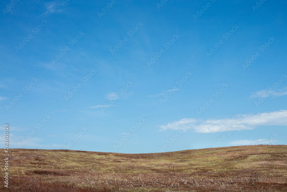 Peaceful Countryside Hill and Sky in Early Spring Time