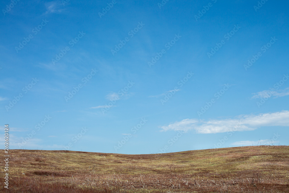 Peaceful Countryside Hill and Sky in Early Spring Time Peaceful Countryside Hill and Sky in Early Spring Time