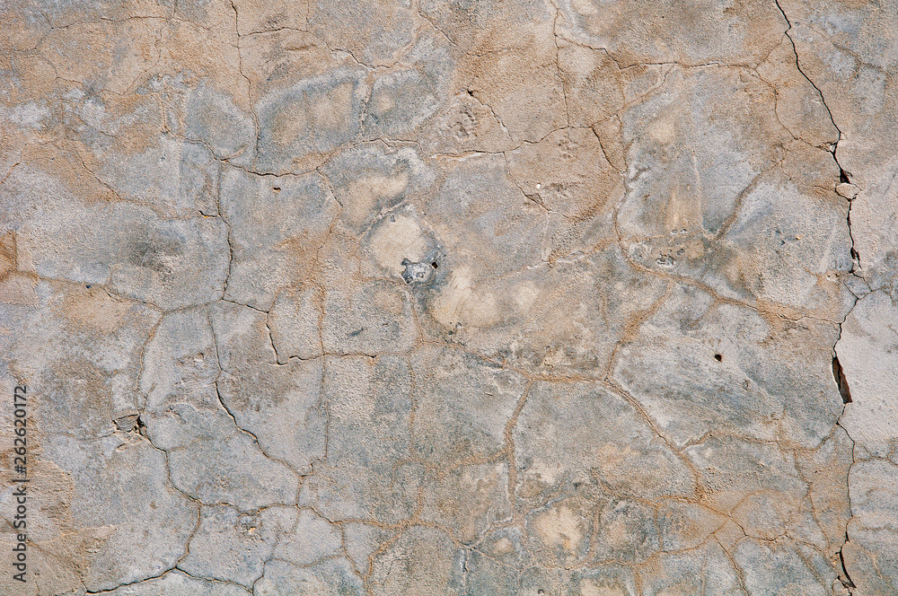Gray concrete textures background. Cracks. Scratches. Damage. Cracked stone wall background Gray concrete textures background. Cracks. Scratches. Damage. Cracked stone wall background