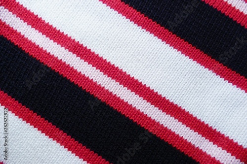 striped knitted knitted closeup background black red white