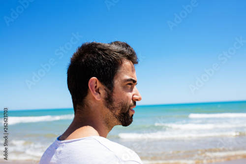 young man on the beach