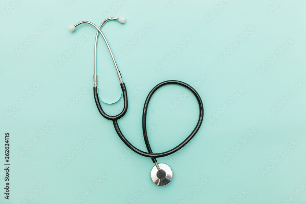 Simply minimal design with medicine equipment stethoscope or phonendoscope isolated on trendy pastel blue background. Instrument device for doctor. Health care life insurance concept Simply minimal design with medicine equipment stethoscope or phonendoscope isolated on trendy pastel blue background. Instrument device for doctor. Health care life insurance concept
