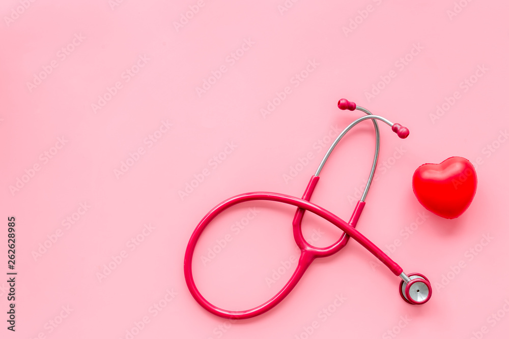 stethoscope and heart for diagnostic and cure of heart disease on pink background top view mockup stethoscope and heart for diagnostic and cure of heart disease on pink background top view mockup