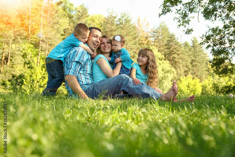 happy family playing in nature happy family playing in nature