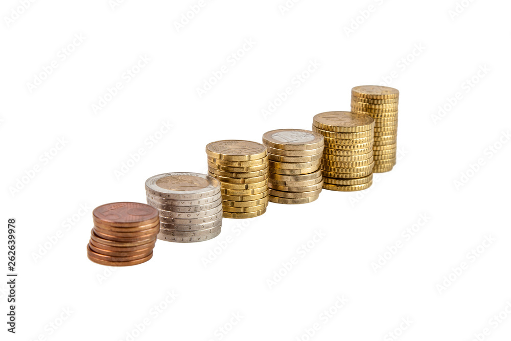 Coins of different countries are stacked hardly in stacks of various heights on a white isolated background. Coins of different countries are stacked hardly in stacks of various heights on a white isolated background.