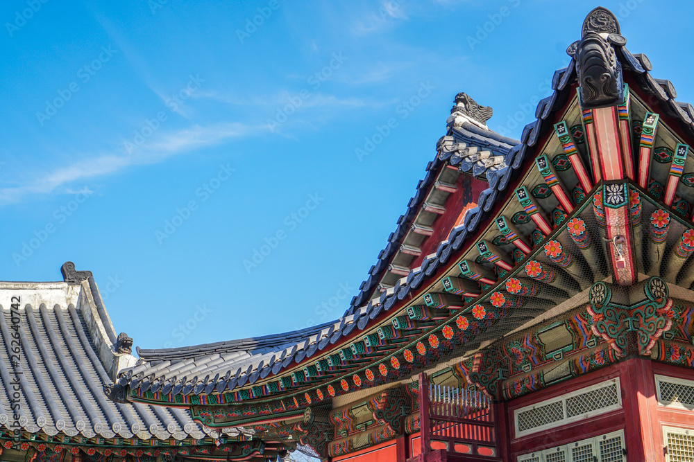 beautiful korean temple architecture with blue skies