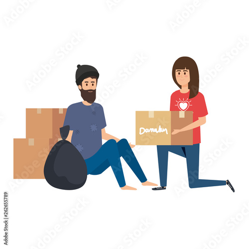 woman volunteer giving a homeless man donations box