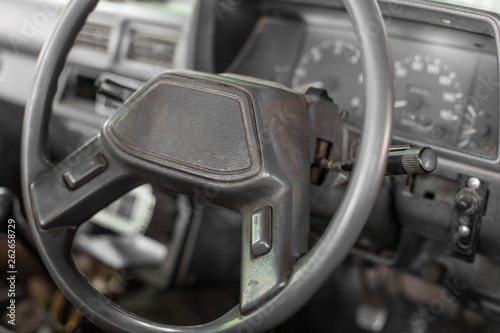 Steering wheel in old pickup © chalongrat