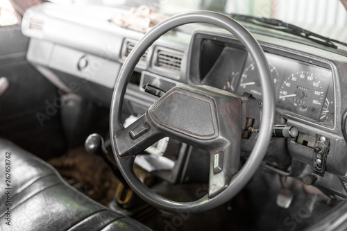 Steering wheel in old pickup © chalongrat