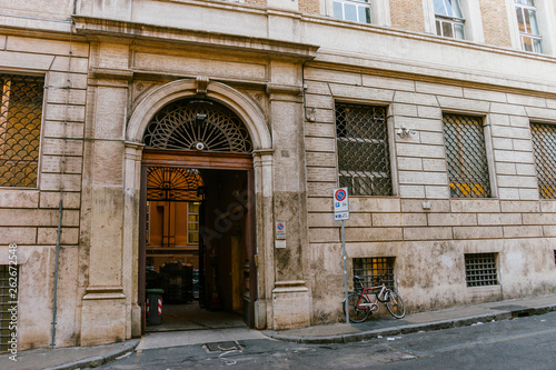 ROME, ITALY - 12 SEPTEMBER 2018: Entrance with a large gate to the ancient building of Rome