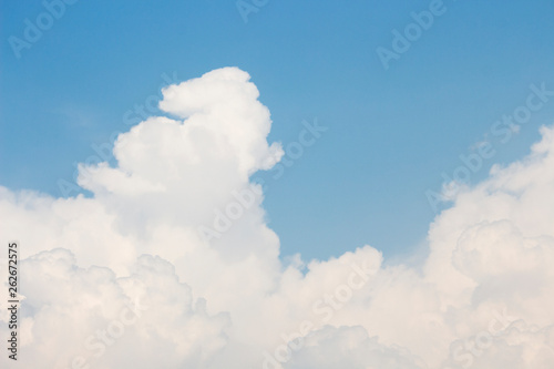 Bright blue sky with white clouds for background or wallpapers