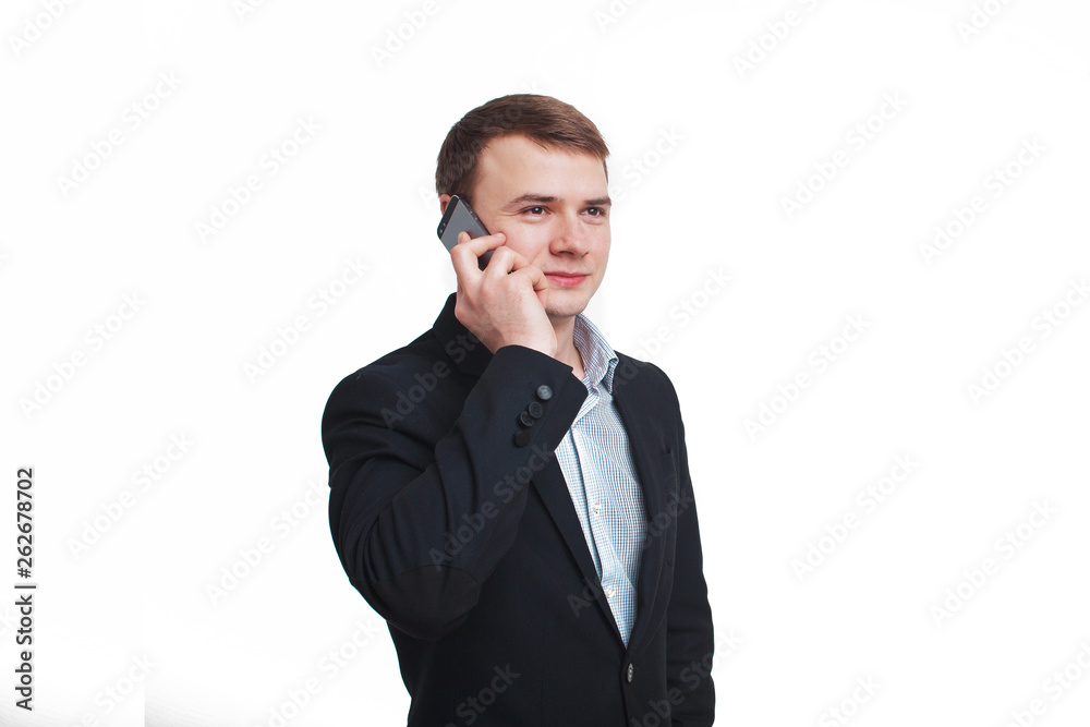 Smiling business man talking on the cell phone, isolated on white background Smiling business man talking on the cell phone, isolated on white background