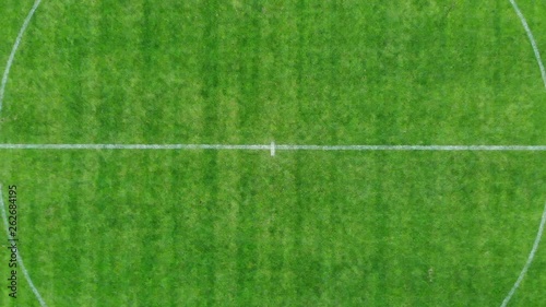 Aerial pull-out shot of the center of the football field Aerial pull-out shot of the center of the football field photo