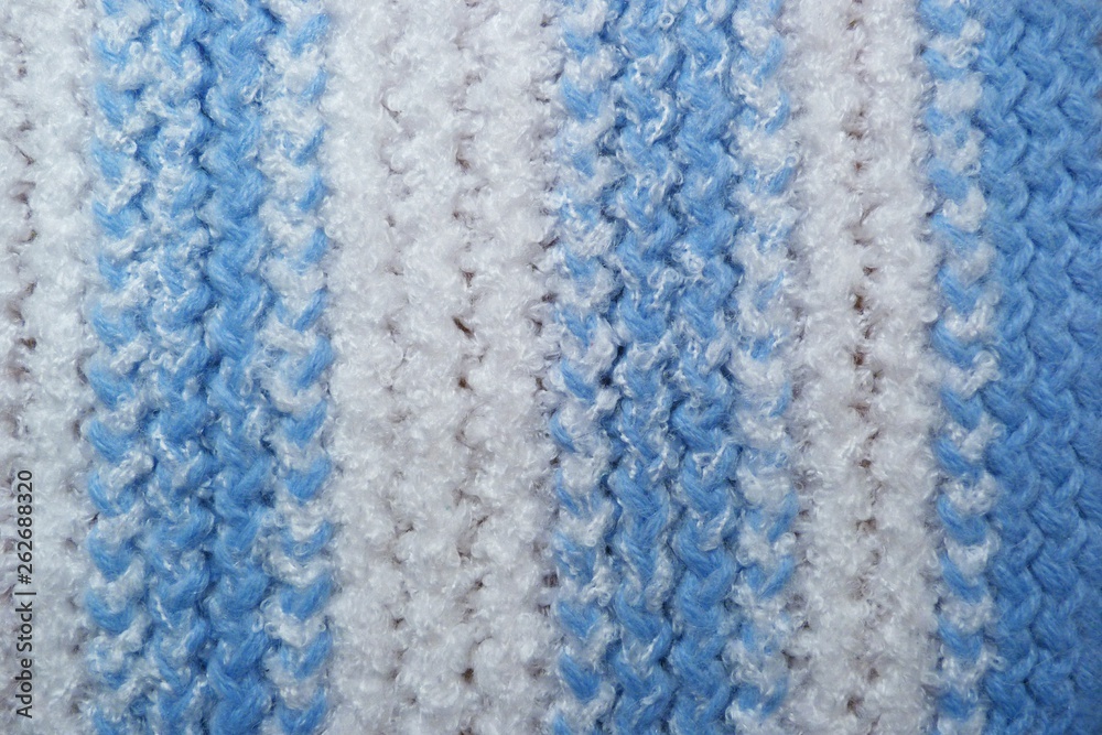 white and blue knitted fabric closeup background white and blue knitted fabric closeup background