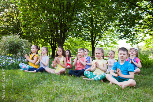 children practicing yoga.