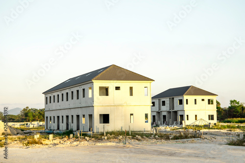 Unfinished building of house. Construction site of house with landscape mountain background, Background of building for business concept, Civil engineering work