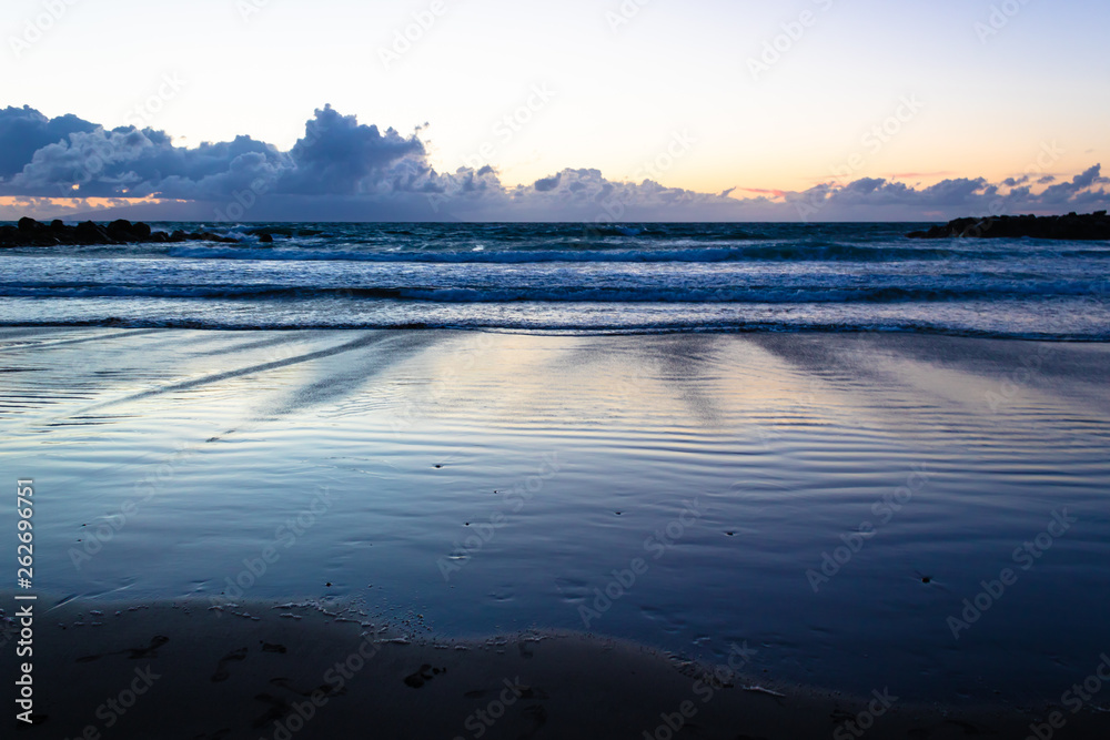 Sea flow at the sunset on the sandy beach, Canary Islands, Tenerife, Spain - Image