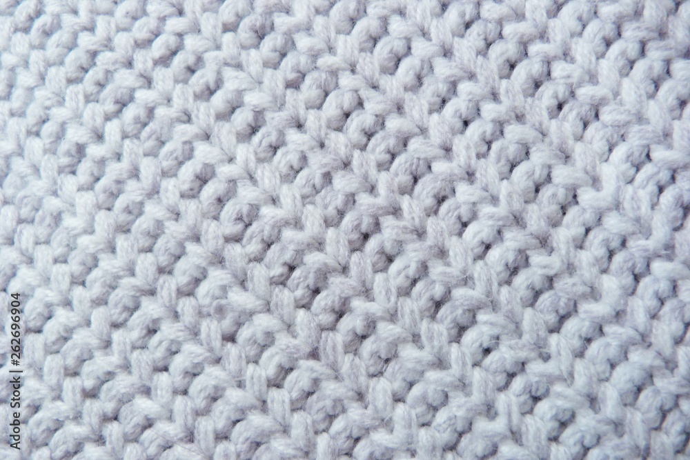 gray knitted fabric closeup knitwear background gray knitted fabric closeup knitwear background