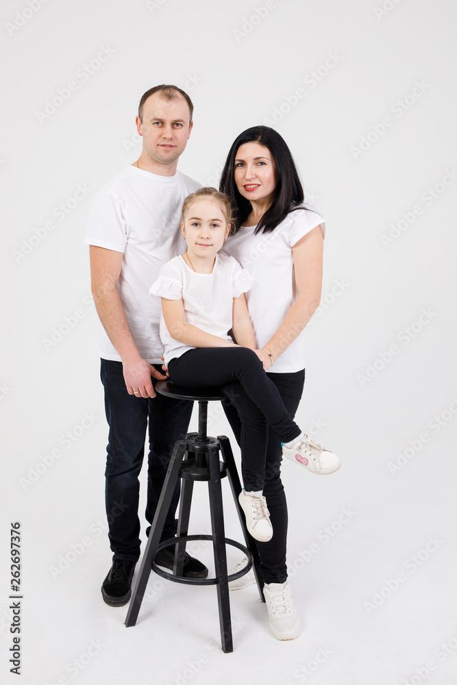 Family - father, mother and daughter - fun and happy, isolated on a white background. After receiving a doctor Family - father, mother and daughter - fun and happy, isolated on a white background. After receiving a doctor
