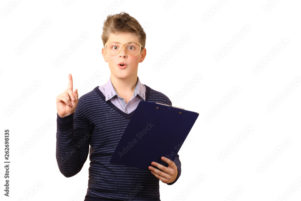 Surprised teenager with glasses holds a pen and looks at the folder Surprised teenager with glasses holds a pen and looks at the folder
