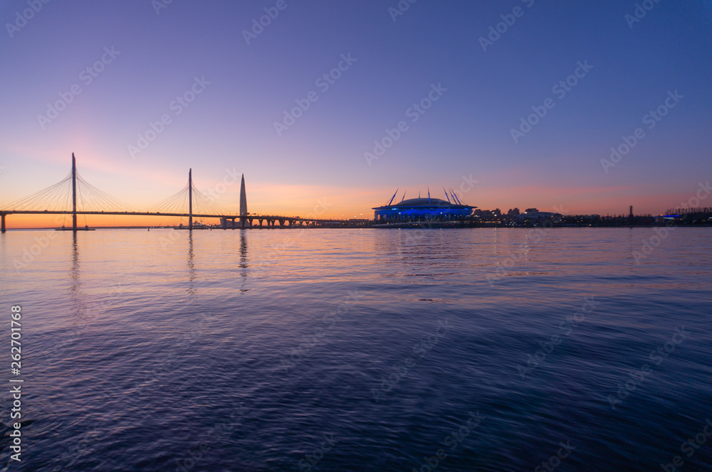 Saint-Petersburg, Russia. Wiews to gulf illuminated by multi-colored lights at night. Saint-Petersburg, Russia. Wiews to gulf illuminated by multi-colored lights at night.