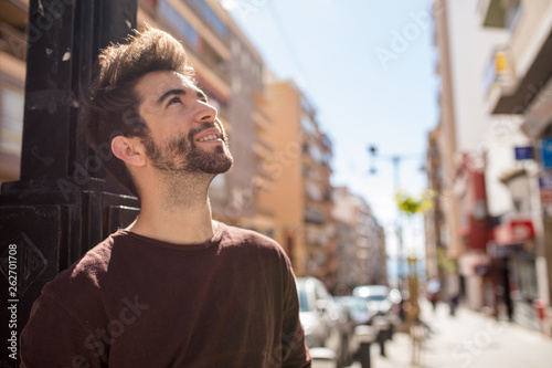 young man looking up
